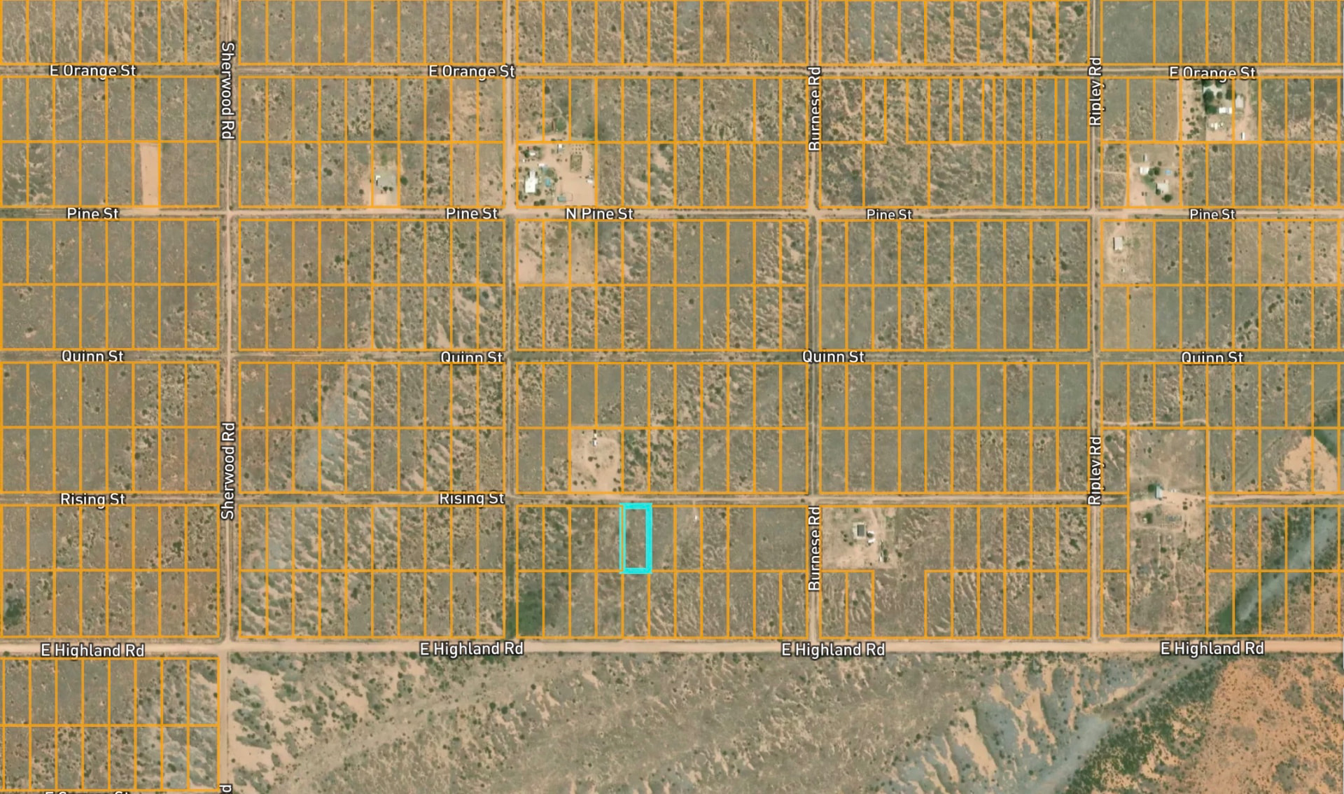 Top-down satellite parcel map with the Arizona Sun Sites lot outlined in cyan near Sherwood Road and East Highland Road
